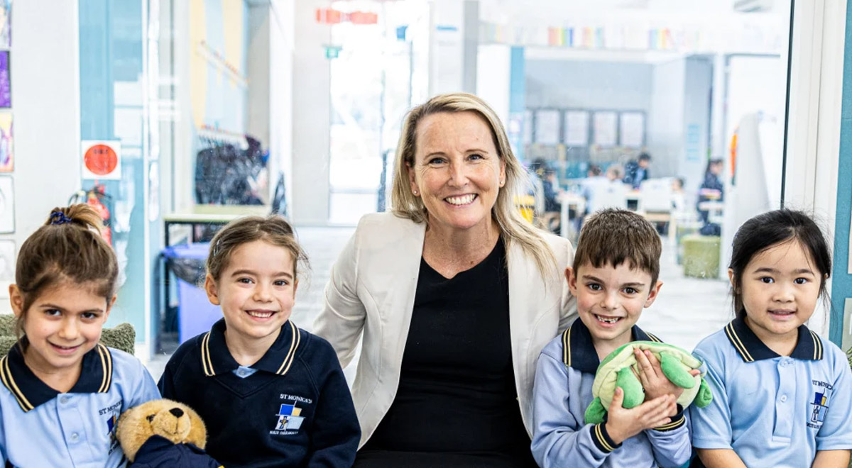 Lisa Crampton, Principal of St Monica's Primary North Parramatat, with four stage one students.